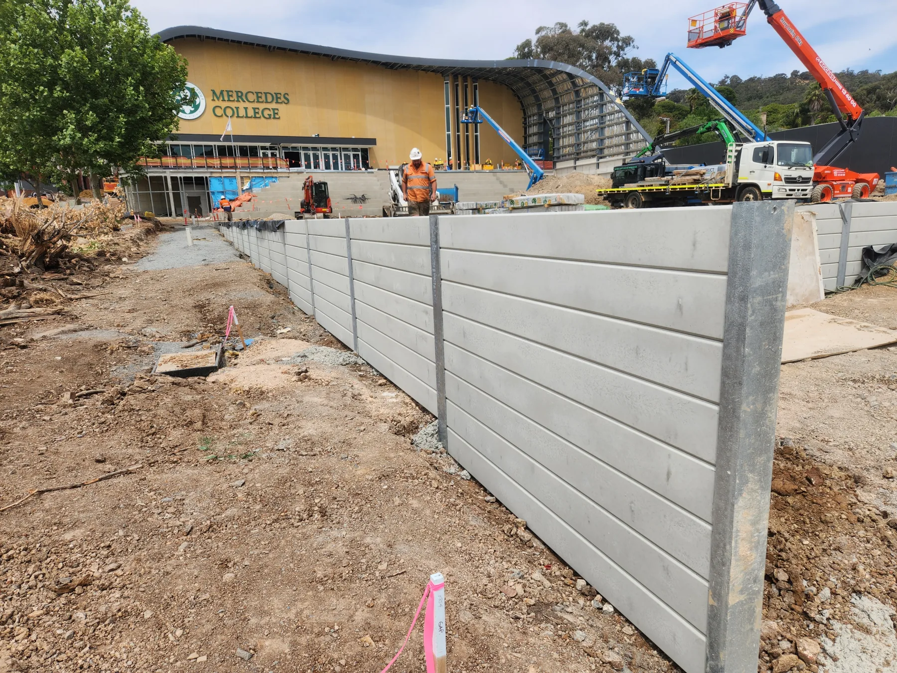 Tiered retaining wall across a steep site